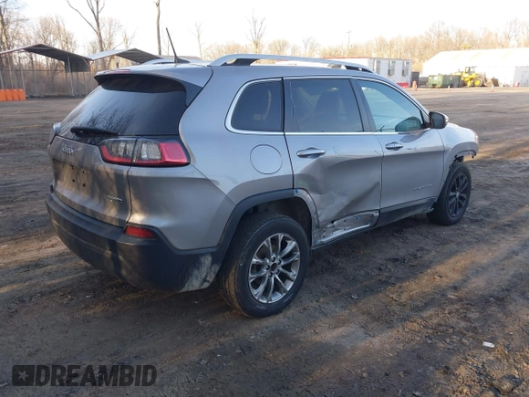 2021 Jeep Cherokee Altitude with VIN 1C4PJLLB1MD183417, listed as a IAAI auction lot 41724254 with 122,657 mi miles. Bid and sale history available at carsss.com. Image 4.