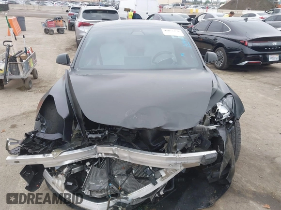 2019 Tesla Model 3 Mid Range with VIN 5YJ3E1EA8KF538083, listed as a IAAI auction lot 41891458 with 46,958 mi miles and . Bid and sale history available at carsss.com. Image 12.