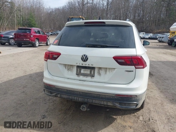 2022 Volkswagen Tiguan S z VIN 3VV0B7AX2NM097402, wystawiony jako IAAI lot #41845707 z przebiegiem 38 668 mil mil oraz . Historia ofert i sprzedaży dostępna na DreamBid. Obrazek 16.