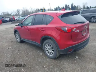 2016 Mazda CX-5 Touring with VIN JM3KE4CY2G0894930, listed as a IAAI auction lot 41906809 with 123,125 mi miles. Bid and sale history available at carsss.com. Image 3.