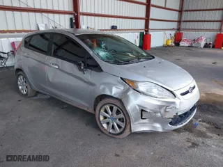 2013 Ford Fiesta SE with VIN 3FADP4EJ2DM173842, listed as a IAAI auction lot 42048262 with 82,637 mi miles. Bid and sale history available at carsss.com. Image 1.