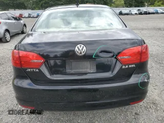 2011 Volkswagen Jetta SEL with VIN 3VWLZ7AJ1BM304504, listed as a Copart auction lot 60991215 with 189,148 mi miles and Salvage title. Bid and sale history available at DreamBid. Image 6.