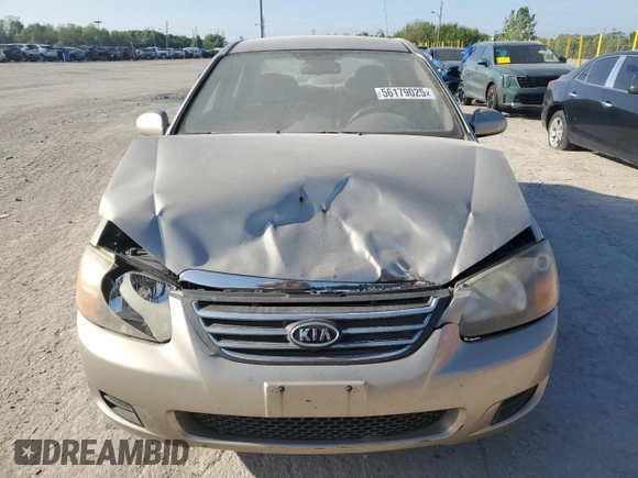 2009 Kia Spectra LX z VIN KNAFE222995618257, wystawiony jako Copart lot #56179025 z przebiegiem 270 087 mil mil oraz Szkoda całkowita • Salvage title. Historia ofert i sprzedaży dostępna na DreamBid. Obrazek 5.