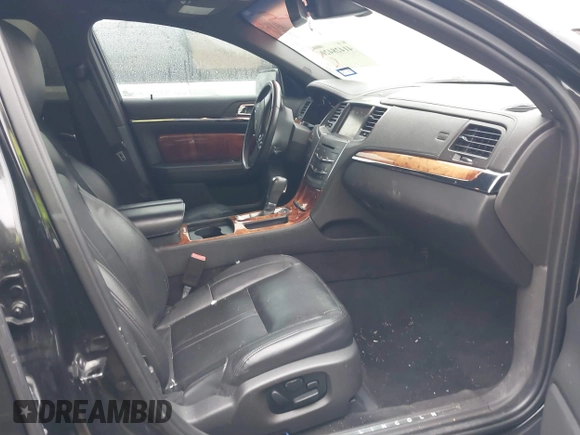 2013 Lincoln MKS EcoBoost with VIN 1LNHL9FT2DG604724, listed as a IAAI auction lot 41428420 with 152,880 mi miles and . Bid and sale history available at DreamBid. Image 5.