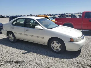 2000 Nissan Altima XE z VIN 1N4DL01D7YC190776, wystawiony jako Copart lot #53376635 z przebiegiem 211 582 mil mil oraz Szkoda całkowita • Salvage title. Historia ofert i sprzedaży dostępna na DreamBid. Obrazek 4.