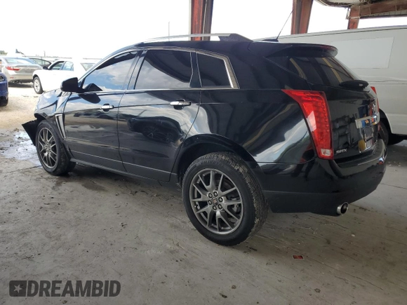 2015 Cadillac SRX Premium Collection with VIN 3GYFNDE38FS596718, listed as a Copart auction lot 56674245 with 106,379 mi miles and Salvage title. Bid and sale history available at DreamBid. Image 2.