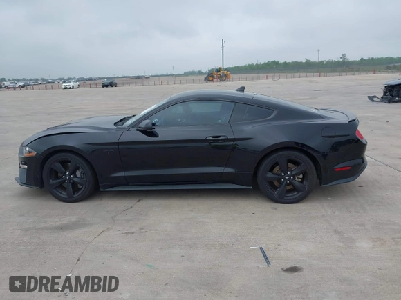 2021 Ford Mustang GT z VIN 1FA6P8CF2M5149691, wystawiony jako IAAI lot #41937878 z przebiegiem 57 865 mil mil oraz . Historia ofert i sprzedaży dostępna na DreamBid. Obrazek 14.