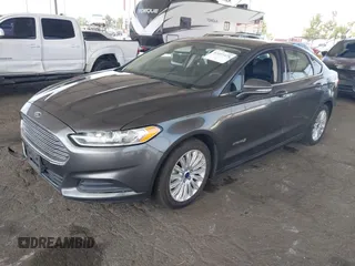 2015 Ford Fusion SE Hybrid with VIN 3FA6P0LU6FR309099, listed as a IAAI auction lot 42497429 with 157,631 mi miles and . Bid and sale history available at DreamBid. Image 2.