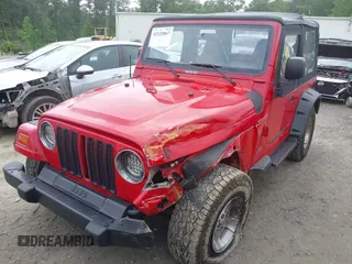 1999 Jeep Wrangler SE z VIN 1J4FY29P5XP487111, wystawiony jako IAAI lot #42125867 z przebiegiem 156 804 mil mil oraz . Historia ofert i sprzedaży dostępna na DreamBid. Obrazek 2.