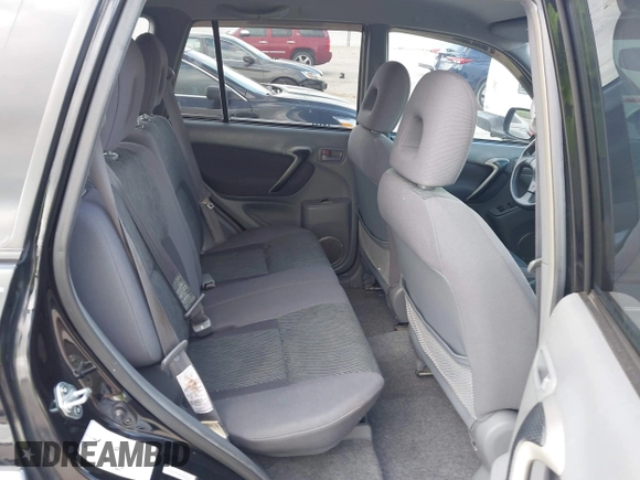 2001 Toyota RAV4 with VIN JTEGH20V910029962, listed as a IAAI auction lot 42092441 with 148,966 mi miles and . Bid and sale history available at DreamBid. Image 8.