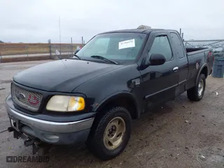 2000 Ford F-150 XL with VIN 1FTRX18LXYNA76850, listed as a IAAI auction lot 41384438 with 167,471 mi miles. Bid and sale history available at carsss.com. Image 15.