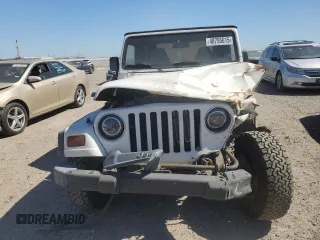 1997 Jeep Wrangler SE with VIN 1J4FY29PXVP411817, listed as a Copart auction lot 48755615 with 125,284 mi miles and Salvage Title. Bid and sale history available at DreamBid. Image 5.