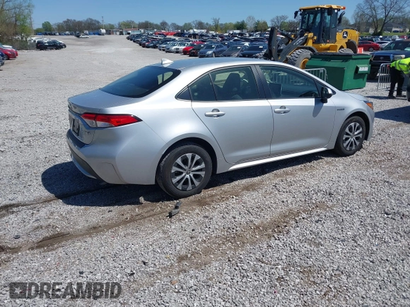 2021 Toyota Corolla Hybrid LE with VIN JTDEAMDE5MJ022110, listed as a IAAI auction lot 41912920 with 59,198 mi miles. Bid and sale history available at carsss.com. Image 4.