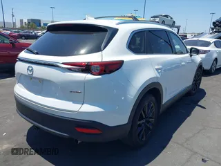 2023 Mazda CX-9 Touring Plus with VIN JM3TCBAY7P0636047, listed as a IAAI auction lot 42309618 with 20,821 mi miles and . Bid and sale history available at DreamBid. Image 4.