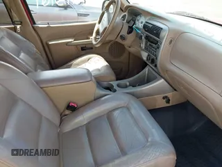 2002 Ford Explorer Sport Trac Value with VIN 1FMZU77E22UC19846, listed as a IAAI auction lot 42115161 with 180,010 mi miles and . Bid and sale history available at DreamBid. Image 5.