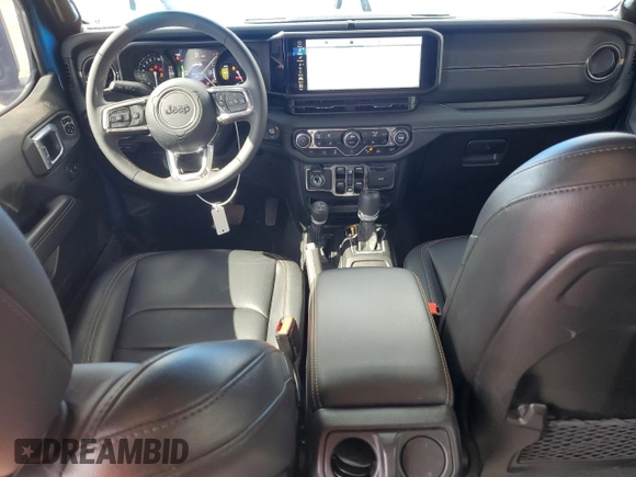 2024 Jeep Wrangler Sahara with VIN 1C4RJXP60RW163829, listed as a Copart auction lot 57182365 with 16,873 mi miles and Salvage title. Bid and sale history available at DreamBid. Image 8.