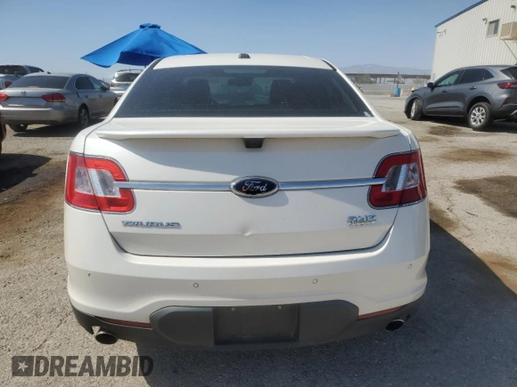 2010 Ford Taurus SHO z VIN 1FAHP2KT6AG105528, wystawiony jako Copart lot #61943515 z przebiegiem 110 544 mil mil oraz Czysty tytuł • Clean title. Historia ofert i sprzedaży dostępna na DreamBid. Obrazek 6.