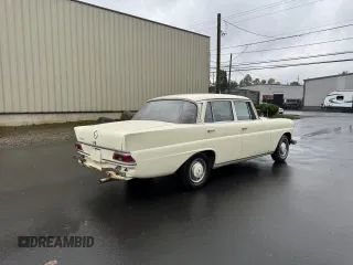 1967 Mercedes-Benz E with VIN 11001010184461, listed as a Copart auction lot 83359704 with 78,345 mi miles and Clean Title. Bid and sale history available at DreamBid. Image 4.