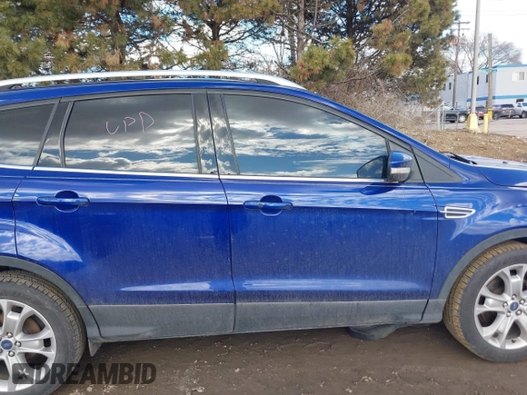 2016 Ford Escape Titanium with VIN 1FMCU9JX5GUA96563, listed as a IAAI auction lot 41695524 with 76,992 mi miles. Bid and sale history available at carsss.com. Image 14.