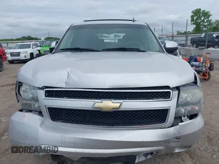 2011 Chevrolet Suburban LT with VIN 1GNSCJE05BR294452, listed as a IAAI auction lot 42107580 with 165,313 mi miles and . Bid and sale history available at DreamBid. Image 13.