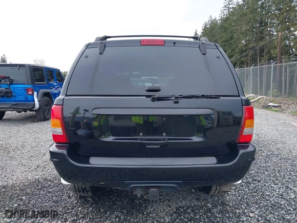 2004 Jeep Grand Cherokee Limited with VIN 1J8GW58N04C186548, listed as a IAAI auction lot 41949015 with 244,505 mi miles. Bid and sale history available at carsss.com. Image 17.