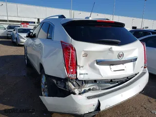 2015 Cadillac SRX Premium Collection with VIN 3GYFNDE35FS545581, listed as a IAAI auction lot 41154403 with 142,146 mi miles. Bid and sale history available at carsss.com. Image 6.