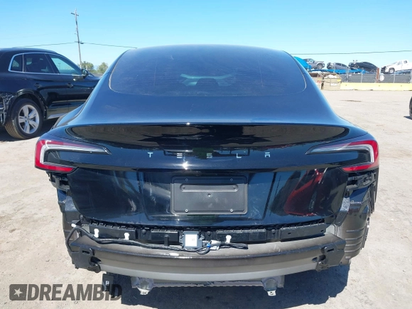 2025 Tesla Model 3 Long Range with VIN 5YJ3E1EA5SF919681, listed as a IAAI auction lot 41818042 with 2,173 mi miles and . Bid and sale history available at DreamBid. Image 17.
