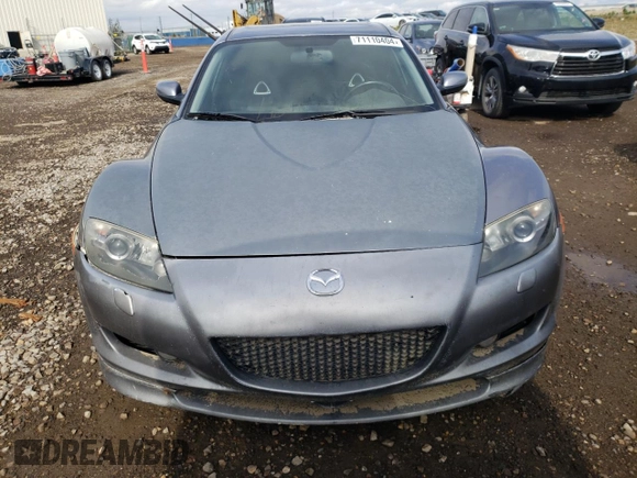 2005 Mazda RX-8 with VIN JM1FE173050145886, listed as a Copart auction lot 71110404 with 66,894 mi miles and Salvage Title. Bid and sale history available at carsss.com. Image 5.