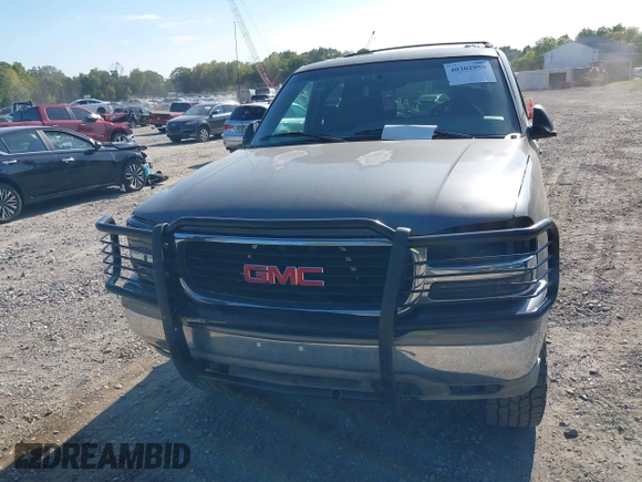 2002 GMC Yukon SLT z VIN 1GKEK13Z42J299221, wystawiony jako IAAI lot #40302959 z przebiegiem 260 096 mil mil oraz . Historia ofert i sprzedaży dostępna na DreamBid. Obrazek 6.