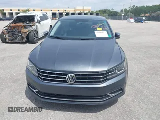 2019 Volkswagen Passat 2.0T Wolfsburg Edition with VIN 1VWLA7A35KC011084, listed as a IAAI auction lot 40385111 with 81,119 mi miles. Bid and sale history available at carsss.com. Image 12.