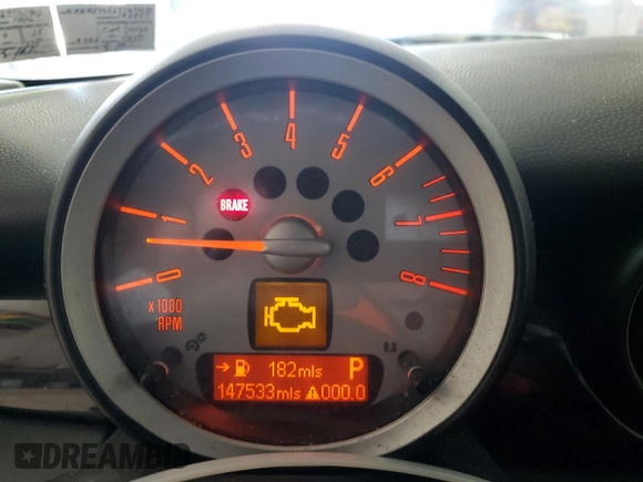 2009 MINI Hardtop with VIN WMWMF33569TW74610, listed as a Copart auction lot 54889805 with 147,533 mi miles and Salvage Title. Bid and sale history available at DreamBid. Image 9.