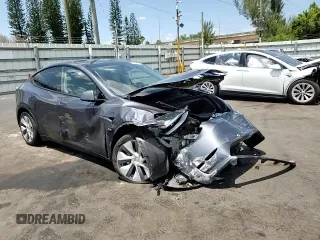 2023 Tesla Model Y Long Range with VIN 7SAYGDEE9PF885405, listed as a Copart auction lot 52858105 with 23,424 mi miles and Non Repairable. Bid and sale history available at DreamBid. Image 11.