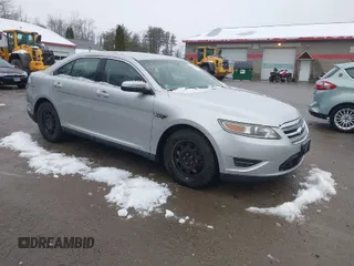 2011 Ford Taurus SEL with VIN 1FAHP2EW3BG124061, listed as a IAAI auction lot 41922716 with 241,464 mi miles. Bid and sale history available at carsss.com. Image 1.