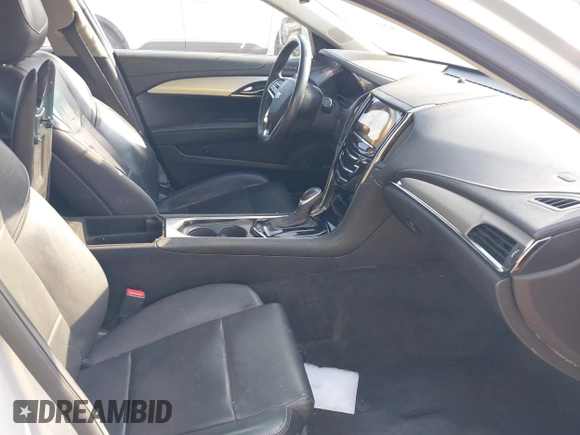 2015 Cadillac ATS Luxury RWD z VIN 1G6AB5RA6F0127029, wystawiony jako IAAI lot #42376359 z przebiegiem 131 823 mil mil oraz . Historia ofert i sprzedaży dostępna na DreamBid. Obrazek 5.
