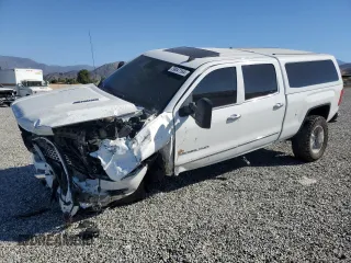 2015 GMC Sierra 2500HD Denali z VIN 1GT120E80FF175769, wystawiony jako Copart lot #79047164 z przebiegiem 116 447 mil mil oraz Szkoda całkowita • Salvage title. Historia ofert i sprzedaży dostępna na DreamBid. Obrazek 1.