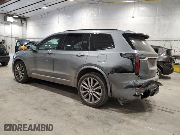 2020 Cadillac XT6 AWD Sport with VIN 1GYKPGRS5LZ145966, listed as a Copart auction lot 66585334 with 76,735 mi miles and Salvage Title. Bid and sale history available at carsss.com. Image 2.