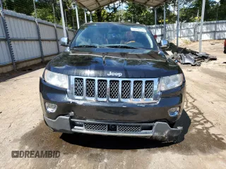 2012 Jeep Grand Cherokee Overland with VIN 1C4RJECTXCC227769, listed as a Copart auction lot 68760174 with 144,537 mi miles and Salvage Title. Bid and sale history available at carsss.com. Image 5.