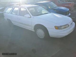1994 Ford Taurus GL with VIN 1FALP57U8RG135607, listed as a Copart auction lot 88725465 with 29,729 mi miles and Clean Title. Bid and sale history available at carsss.com. Image 4.