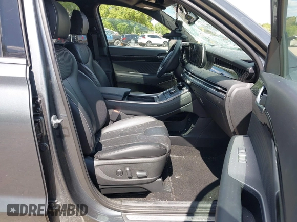 2023 Hyundai Palisade Calligraphy z VIN KM8R7DGE5PU499257, wystawiony jako IAAI lot #42231889 z przebiegiem 90 714 mil mil oraz . Historia ofert i sprzedaży dostępna na DreamBid. Obrazek 5.