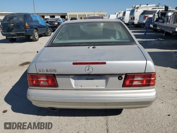 2000 Mercedes-Benz SL-Class with VIN WDBFA68F7YF190504, listed as a Copart auction lot 71000714 with 0 mi miles and Clean Title. Bid and sale history available at carsss.com. Image 6.