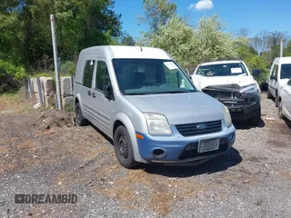 2011 Ford Transit Connect XLT z VIN NM0LS7BN3BT068980, wystawiony jako IAAI lot #41746496 z przebiegiem 98 257 mil mil oraz . Historia ofert i sprzedaży dostępna na DreamBid. Obrazek 1.