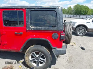 2018 Jeep Wrangler Unlimited Sahara with VIN 1C4HJXEG6JW174359, listed as a IAAI auction lot 42009968 with 79,830 mi miles and . Bid and sale history available at DreamBid. Image 21.