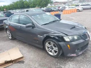 2009 Pontiac G8 z VIN 6G2ER57789L169343, wystawiony jako IAAI lot #42391701 z przebiegiem 293 400 mil mil oraz . Historia ofert i sprzedaży dostępna na DreamBid. Obrazek 1.