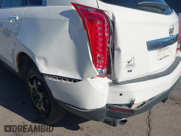 2012 Cadillac SRX Luxury Collection z VIN 3GYFNAE32CS518428, wystawiony jako IAAI lot #42153391 z przebiegiem 159 836 mil mil oraz . Historia ofert i sprzedaży dostępna na DreamBid. Obrazek 6.
