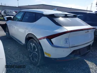 2022 Kia EV6 Wind with VIN KNDC3DLCXN5033602, listed as a IAAI auction lot 41489710 with 81,927 mi miles. Bid and sale history available at carsss.com. Image 3.