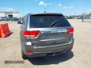 2011 Jeep Grand Cherokee Laredo with VIN 1J4RR4GGXBC587911, listed as a IAAI auction lot 42156885 with 178,999 mi miles and . Bid and sale history available at DreamBid. Image 16.