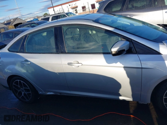 2017 Ford Focus SEL with VIN 1FADP3H21HL336597, listed as a IAAI auction lot 41729173 with 166,140 mi miles. Bid and sale history available at carsss.com. Image 13.