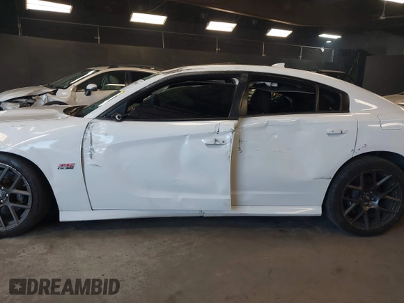 2019 Dodge Charger Scat Pack с VIN 2C3CDXGJ4KH674406, выставлен на аукционе IAAI как лот 42083857 с пробегом 54 510 миль миль и . История ставок и продаж доступна на DreamBid. Изображение 14.