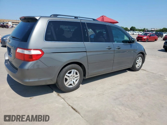 2007 Honda Odyssey EX with VIN 5FNRL38437B068697, listed as a Copart auction lot 60875505 with 211,688 mi miles and Salvage title. Bid and sale history available at DreamBid. Image 3.