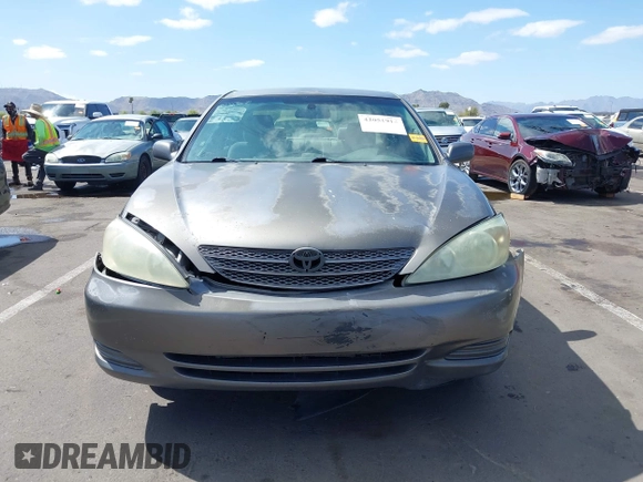 2004 Toyota Camry LE with VIN 4T1BE32K44U825561, listed as a IAAI auction lot 42051914 with 244,521 mi miles and . Bid and sale history available at DreamBid. Image 11.
